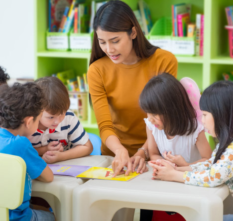 School teacher with children